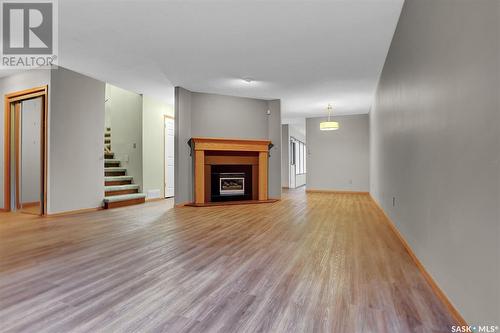 25 2338 Assiniboine Avenue E, Regina, SK - Indoor Photo Showing Living Room With Fireplace