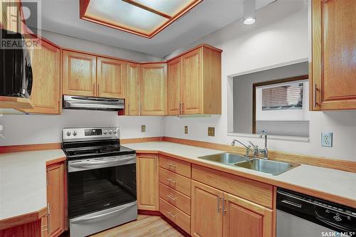 25 2338 Assiniboine Avenue E, Regina, SK - Indoor Photo Showing Kitchen With Double Sink