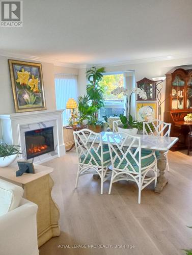 2203 - 701 Geneva Street, St. Catharines (437 - Lakeshore), ON - Indoor Photo Showing Living Room With Fireplace