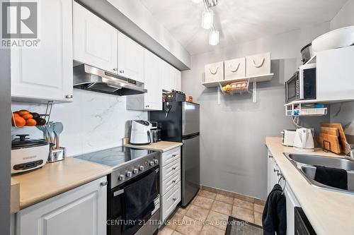 1813 - 1 Lee Centre Drive, Toronto, ON - Indoor Photo Showing Kitchen With Double Sink