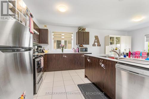 58 Brennan Crescent, Loyalist, ON - Indoor Photo Showing Kitchen With Stainless Steel Kitchen With Double Sink