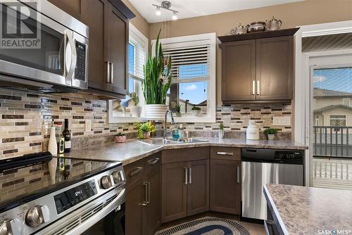 4209 Green Olive Way E, Regina, SK - Indoor Photo Showing Kitchen With Stainless Steel Kitchen With Double Sink