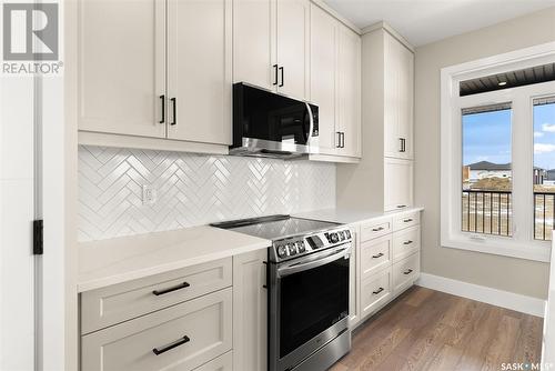 202 Fairway Road, Emerald Park, SK - Indoor Photo Showing Kitchen With Upgraded Kitchen