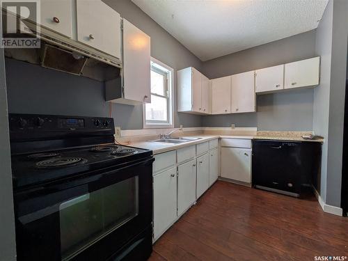 1925 Robinson Street, Regina, SK - Indoor Photo Showing Kitchen With Double Sink