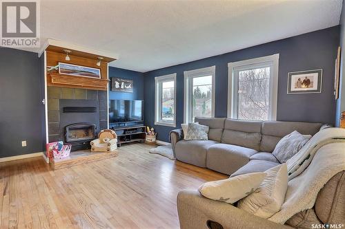 232 Otter Street, Air Ronge, SK - Indoor Photo Showing Living Room With Fireplace