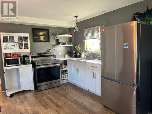 103 6100 Dakelh Ti, Prince George, BC - Indoor Photo Showing Kitchen With Double Sink