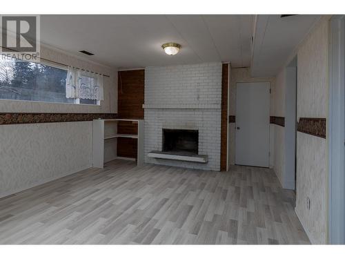 4712 Gair Avenue, Terrace, BC - Indoor Photo Showing Other Room With Fireplace