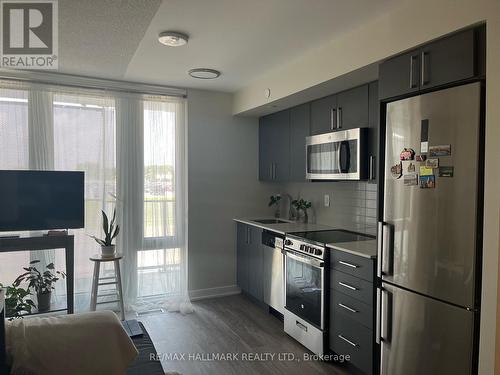 104 - 38 Monte Kwinter Court, Toronto, ON - Indoor Photo Showing Kitchen