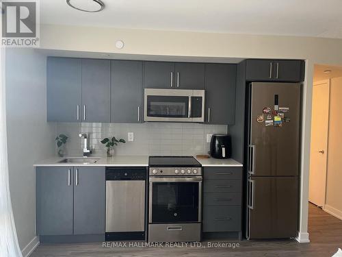 104 - 38 Monte Kwinter Court, Toronto, ON - Indoor Photo Showing Kitchen