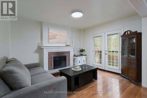 42 Bluebell Crescent, Whitby, ON - Indoor Photo Showing Living Room With Fireplace