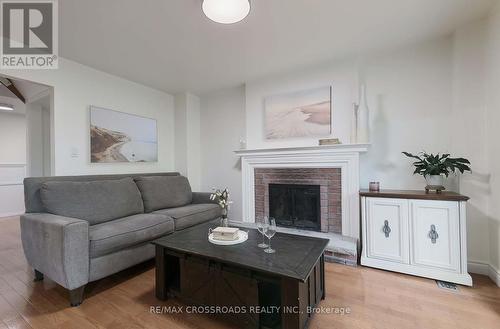 42 Bluebell Crescent, Whitby, ON - Indoor Photo Showing Living Room With Fireplace