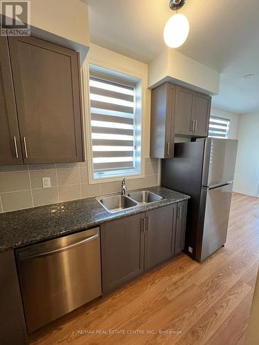 312- 32 - 10 Halliford Place, Brampton, ON - Indoor Photo Showing Kitchen With Stainless Steel Kitchen With Double Sink