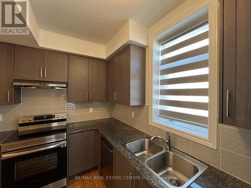 312- 32 - 10 Halliford Place, Brampton, ON - Indoor Photo Showing Kitchen With Double Sink