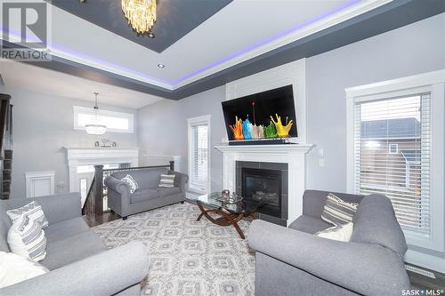 770 Labine Court, Saskatoon, SK - Indoor Photo Showing Living Room With Fireplace