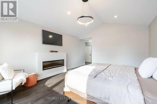 560 Woodview Road, Burlington, ON - Indoor Photo Showing Bedroom With Fireplace