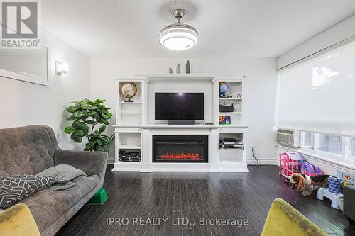 270 - 3060 Constitution Boulevard, Mississauga, ON - Indoor Photo Showing Living Room With Fireplace