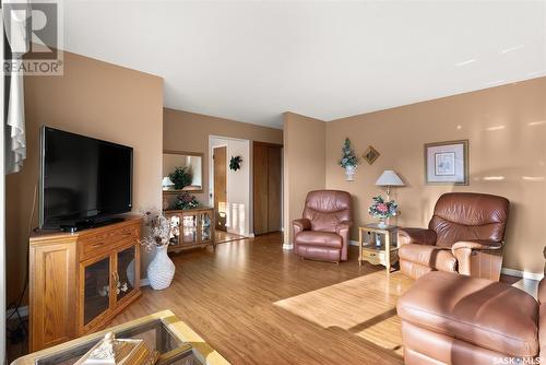 30 Hammond Road, Regina, SK - Indoor Photo Showing Living Room With Fireplace