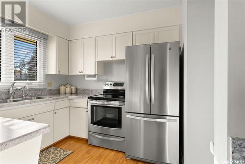 30 Hammond Road, Regina, SK - Indoor Photo Showing Kitchen With Stainless Steel Kitchen With Double Sink