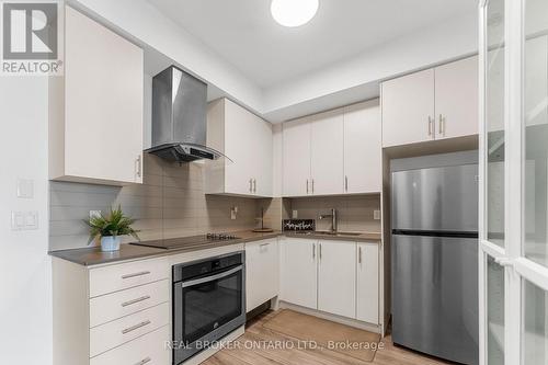 707 - 195 Bonis Avenue, Toronto, ON - Indoor Photo Showing Kitchen With Stainless Steel Kitchen