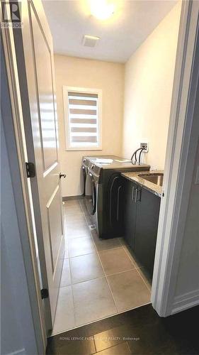 60 Stowmarket Street, Caledon, ON - Indoor Photo Showing Laundry Room