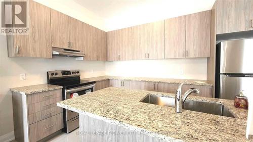 60 Stowmarket Street, Caledon, ON - Indoor Photo Showing Kitchen With Stainless Steel Kitchen With Double Sink With Upgraded Kitchen