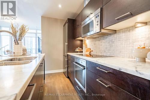 2206 - 90 Park Lawn Road S, Toronto, ON - Indoor Photo Showing Kitchen With Double Sink With Upgraded Kitchen