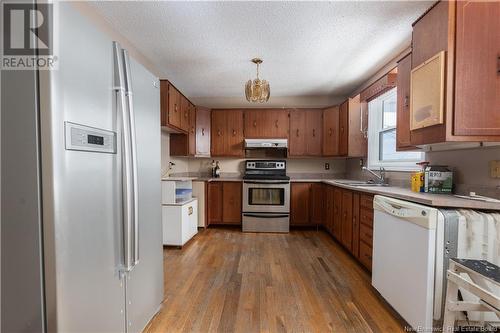 57 Communication Road, Irishtown, NB - Indoor Photo Showing Kitchen With Double Sink