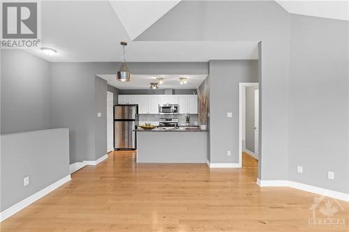 Great for hosting guests while preparing meals. - 231 Crestway Drive Unit#J, Ottawa, ON - Indoor Photo Showing Kitchen