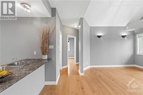 Hallway to bedrooms & Full bathroom. - 231 Crestway Drive Unit#J, Ottawa, ON - Indoor