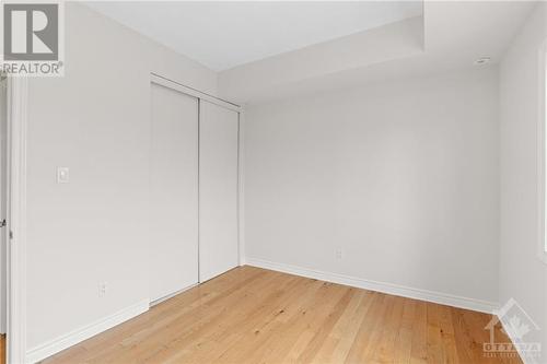 2nd bedroom- double closet. - 231 Crestway Drive Unit#J, Ottawa, ON - Indoor Photo Showing Other Room