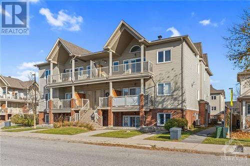 Outdoor parking space included #62. Visitor parking also available. - 231 Crestway Drive Unit#J, Ottawa, ON - Outdoor With Balcony With Facade