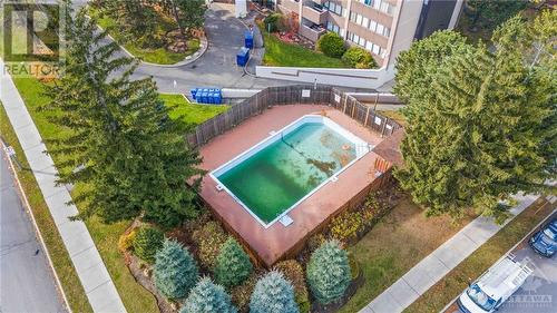 Outdoor pool- active from spring until fall! - 1285 Cahill Drive Unit#507, Ottawa, ON - Outdoor With In Ground Pool With View