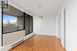 Dining room w/ hanging fixture and walkout to cement balcony with Southern Vistas! - 