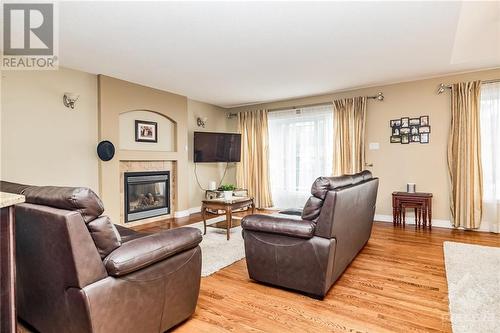 128 Olde Towne Avenue, Russell, ON - Indoor Photo Showing Living Room With Fireplace