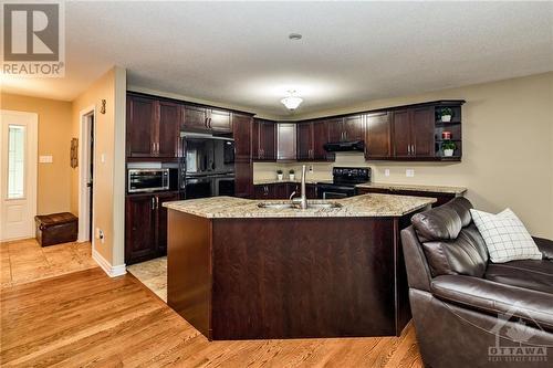 128 Olde Towne Avenue, Russell, ON - Indoor Photo Showing Kitchen With Double Sink