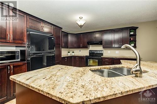 128 Olde Towne Avenue, Russell, ON - Indoor Photo Showing Kitchen With Double Sink