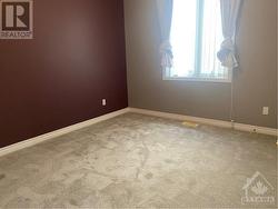 second bedroom with new carpeting - 