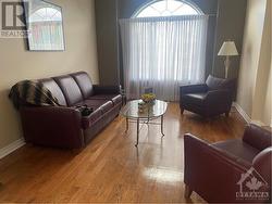 living room with hardwood flooring - 