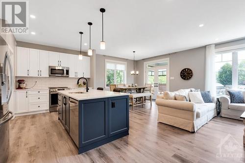 Exquisite quartz kitchen designed for family and gatherings - 11 New Haven Gate, Westport, ON - Indoor