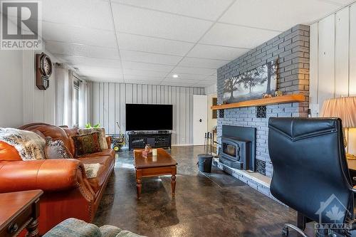 4225 Scotch Line, Perth, ON - Indoor Photo Showing Living Room With Fireplace