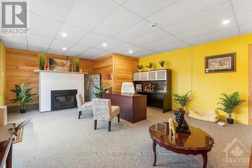 4225 Scotch Line, Tay Valley, ON - Indoor Photo Showing Other Room With Fireplace