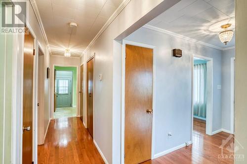 Hallway - Foyer on the right, Carport door at the end of the hall - 18144 7 Highway, Perth, ON - Indoor Photo Showing Other Room