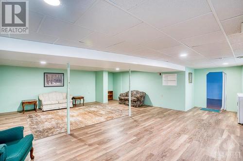 Family Room - viewed from the stairs - 18144 7 Highway, Perth, ON - Indoor Photo Showing Basement