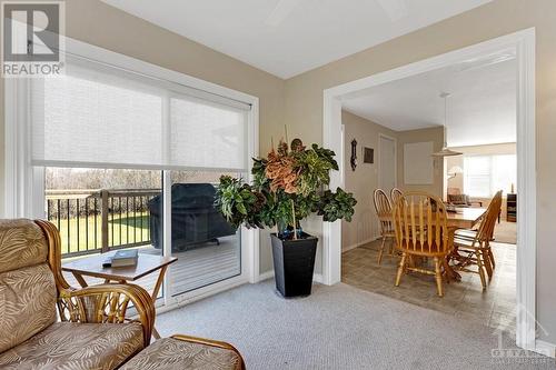 Wide opening from dining room to sunroom - 2230 Tennyson Road, Perth, ON - Indoor