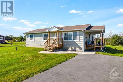 Home has paved driveway and interlock walkway - 2230 Tennyson Road, Perth, ON - Outdoor