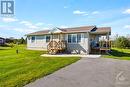 Home has paved driveway and interlock walkway - 2230 Tennyson Road, Perth, ON  - Outdoor 