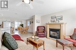 Living room open to dining room and kitchen - 