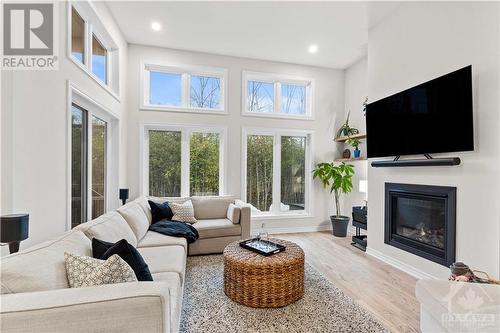 214 Blackhorse Drive, Ottawa, ON - Indoor Photo Showing Living Room With Fireplace