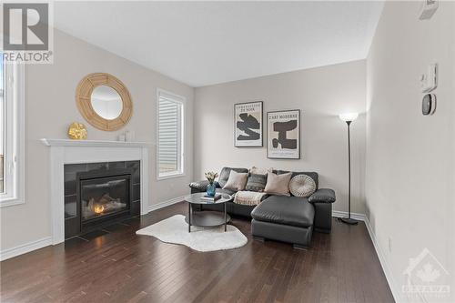 321 Meadowbreeze Drive, Ottawa, ON - Indoor Photo Showing Living Room With Fireplace