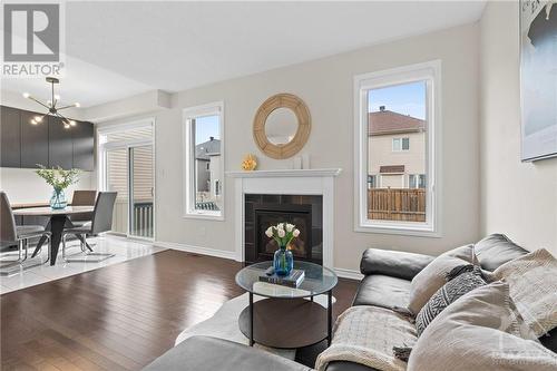 321 Meadowbreeze Drive, Ottawa, ON - Indoor Photo Showing Living Room With Fireplace